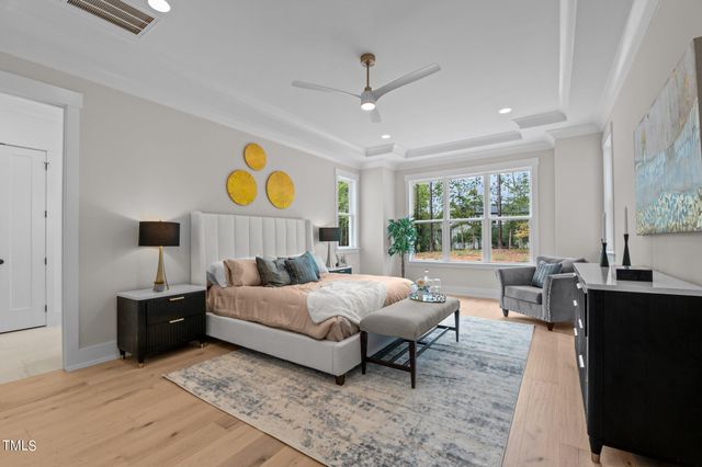 a bed room with a bed and a fish tank