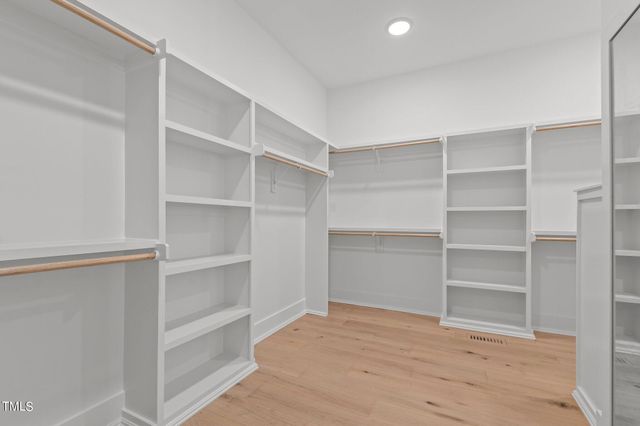a view of an empty room with empty racks