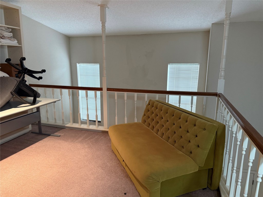 7575 Cambridge Street, Unit 2704 Houston, TX 77054 - Photo 17 of 28 a bedroom with furniture and wooden floor