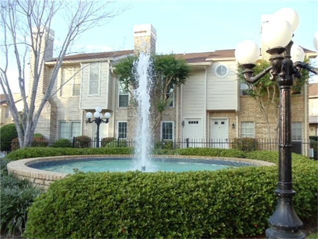 7575 Cambridge Street, Unit 2704 Houston, TX 77054 - Photo 27 of 28 a front view of a house with garden