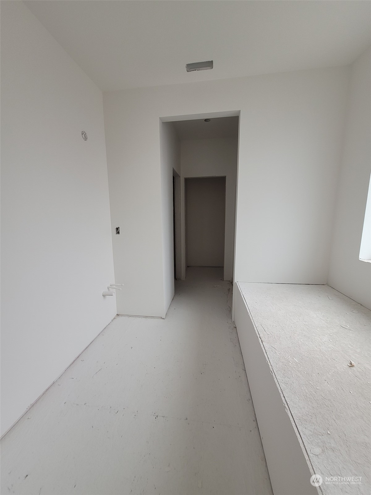 32 Roup Road Montesano, WA 98563 - Photo 14 of 20 a view of an empty room with a fireplace