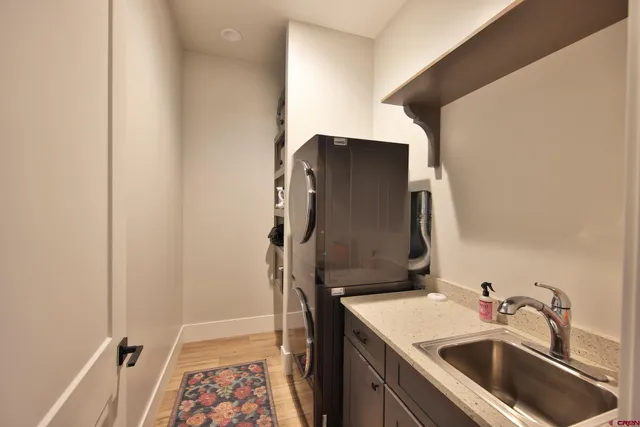 a bathroom with a sink and mirror