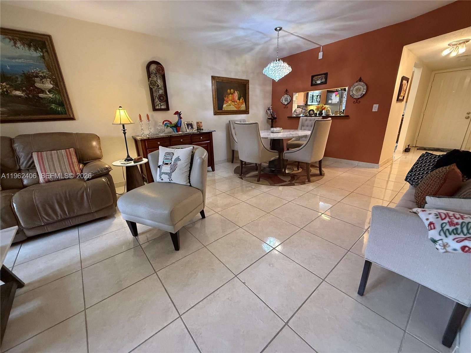 351 Club Circle, Unit 102 Boca Raton, FL 33487 - Photo 14 of 34 a living room with furniture and a couch