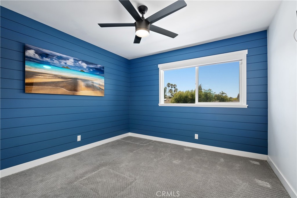 2744 Gannet Drive Costa Mesa, CA 92626 - Photo 28 of 39 a view of a hallway with a large window
