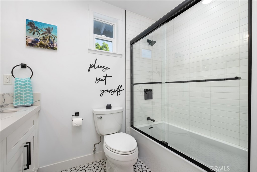 2744 Gannet Drive Costa Mesa, CA 92626 - Photo 32 of 39 a bathroom with a shower a toilet and a sink