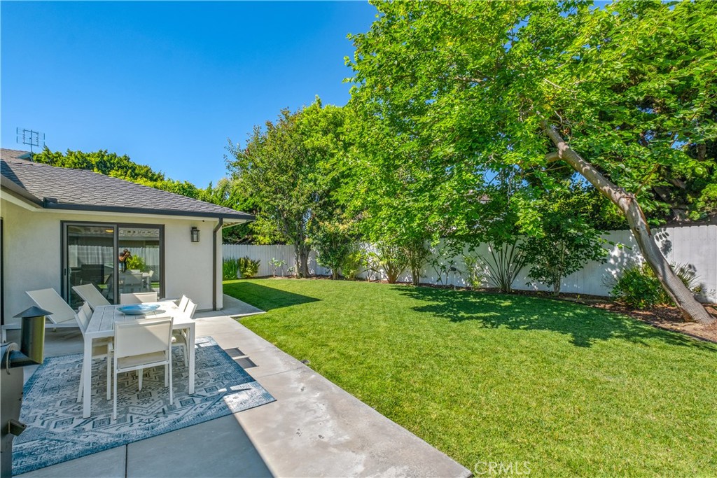 2744 Gannet Drive Costa Mesa, CA 92626 - Photo 35 of 39 a view of a house with backyard sitting area and garden