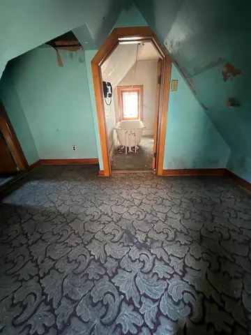 a view of a livingroom with a staircase