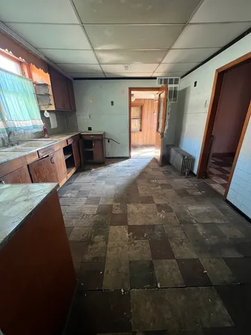 a large room with lots of furniture and window