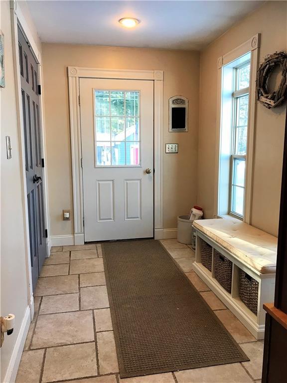 562 Springy Pond Road Ellsworth, ME 04605 - Photo 8 of 33 Mudroom has large closet, bench area...
