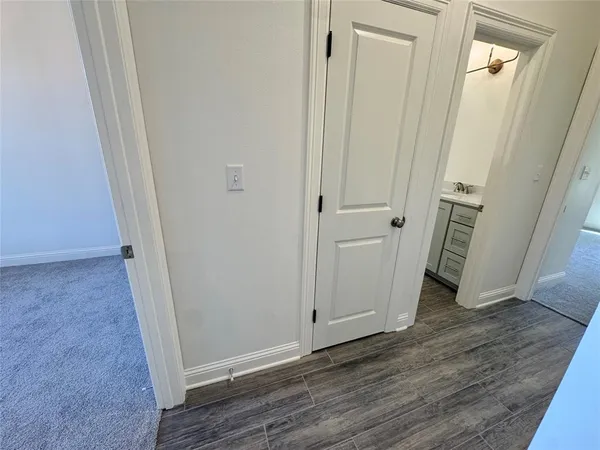 a view of an empty walk in closet