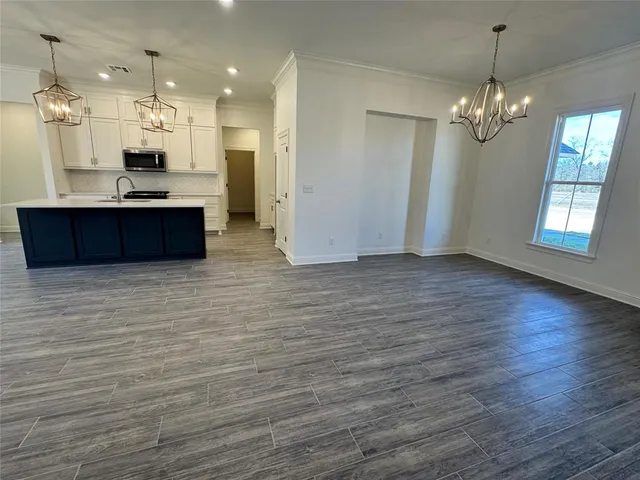 a hallway with washer and dryer