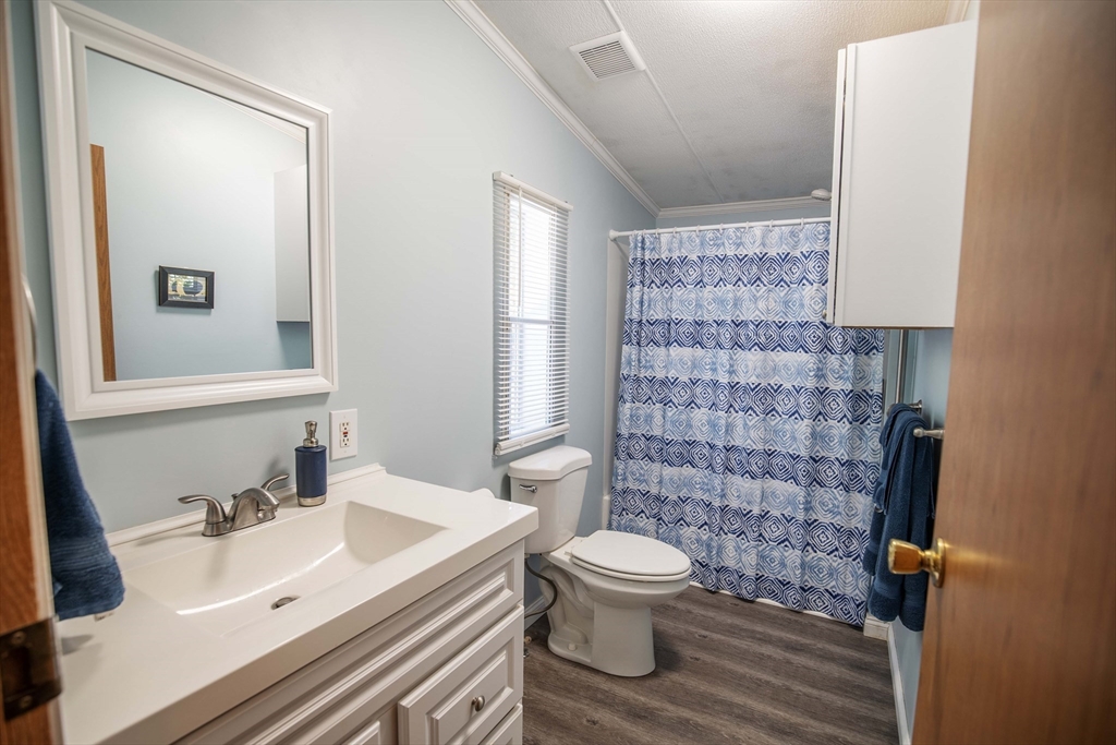 157 Scotland Road Newbury, MA 01951 - Photo 17 of 34 a bathroom with a sink toilet and shower