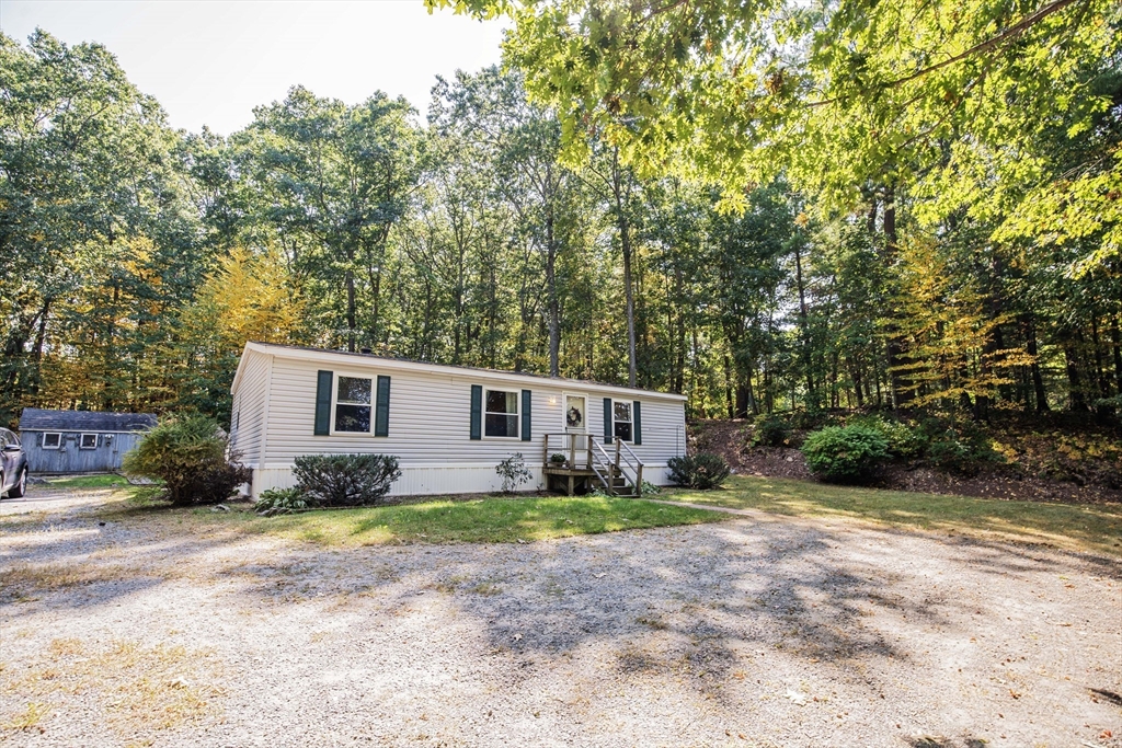 157 Scotland Road Newbury, MA 01951 - Photo 2 of 34 a view of a house with backyard and trees
