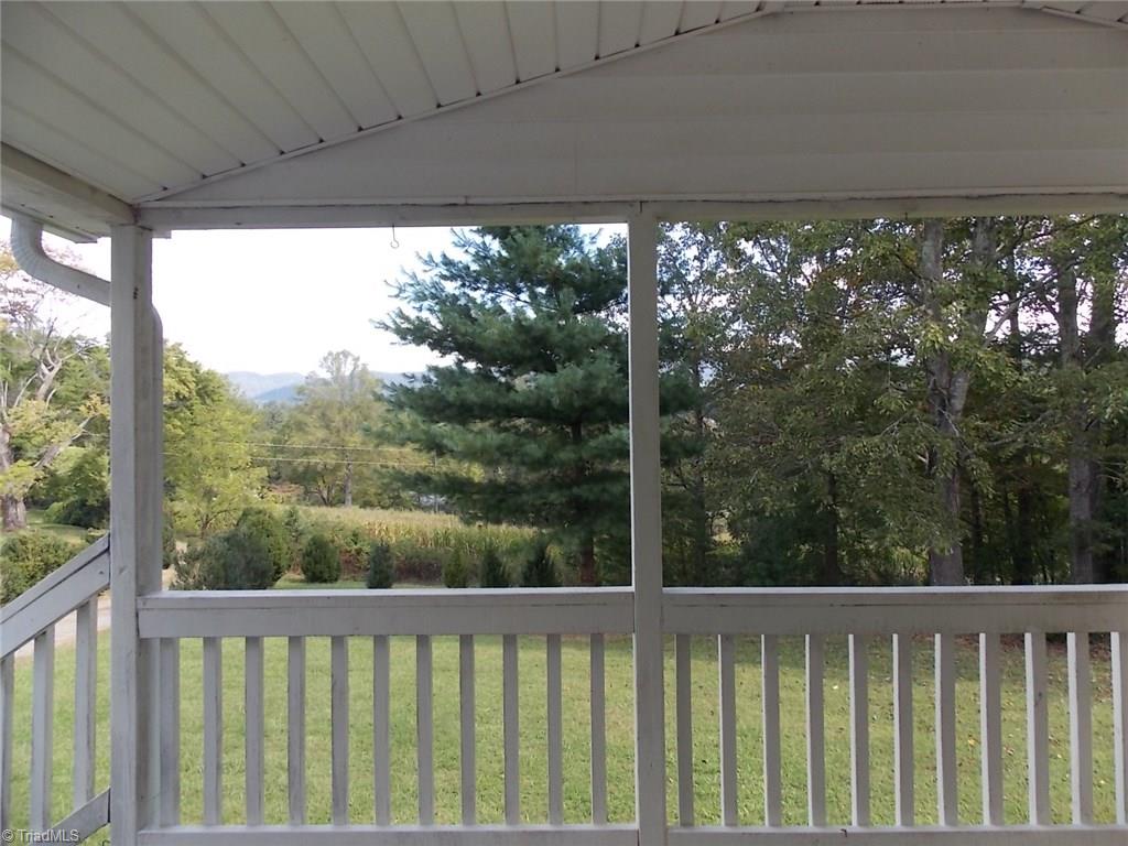 387 Carson Creek Road Lowgap, NC 27024 - Photo 4 of 18 Covered Front Porch