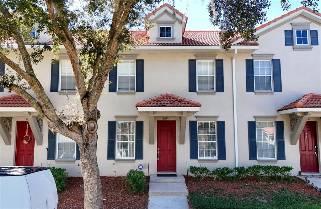 front view of a house with a yard