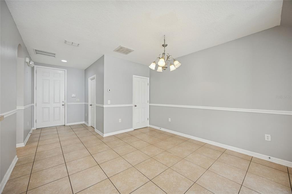 3140 Riachuelo Lane Kissimmee, FL 34744 - Photo 12 of 24 wooden floor in an empty room