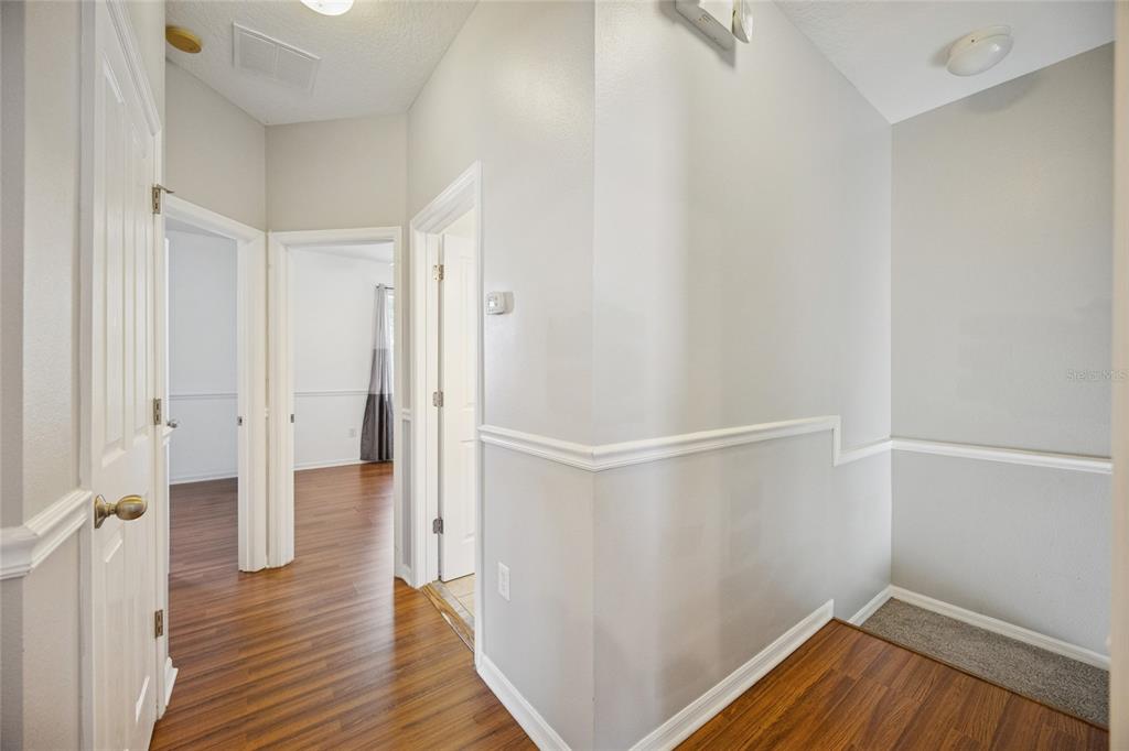 3140 Riachuelo Lane Kissimmee, FL 34744 - Photo 14 of 24 a view of a room with wooden floor