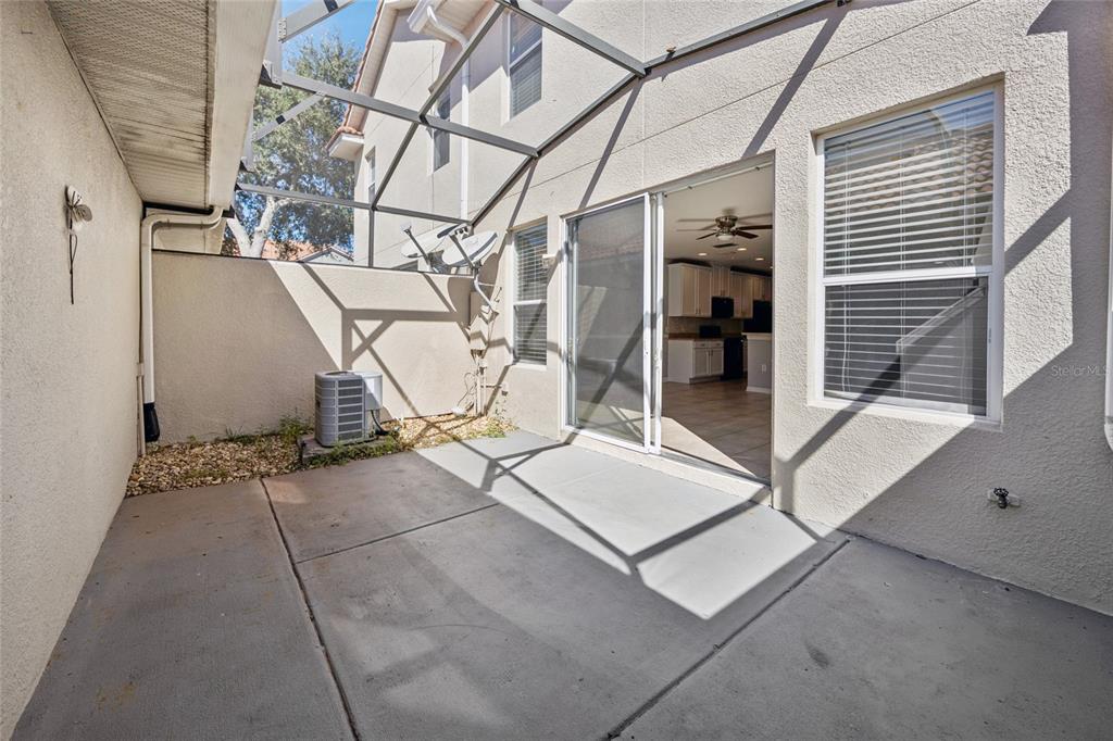 3140 Riachuelo Lane Kissimmee, FL 34744 - Photo 19 of 24 a view of a room with table and chairs