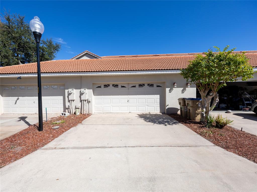 3140 Riachuelo Lane Kissimmee, FL 34744 - Photo 3 of 24 a front view of a house with a yard