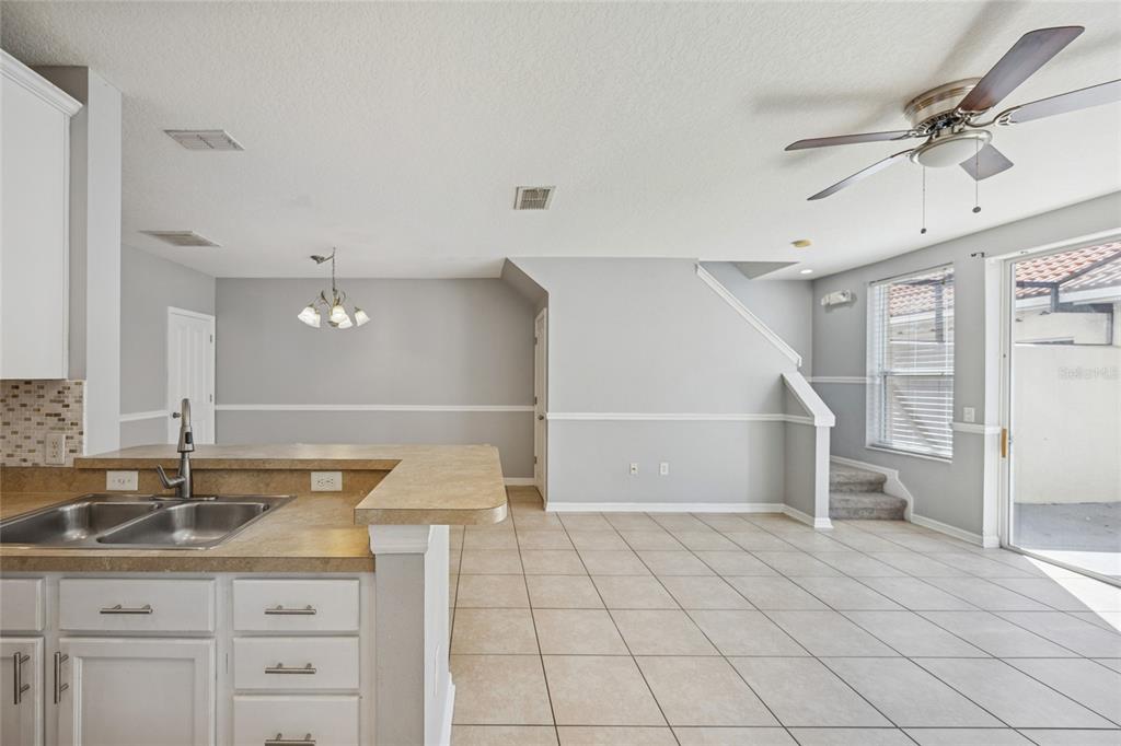 3140 Riachuelo Lane Kissimmee, FL 34744 - Photo 10 of 24 a bathroom with a sink and a mirror