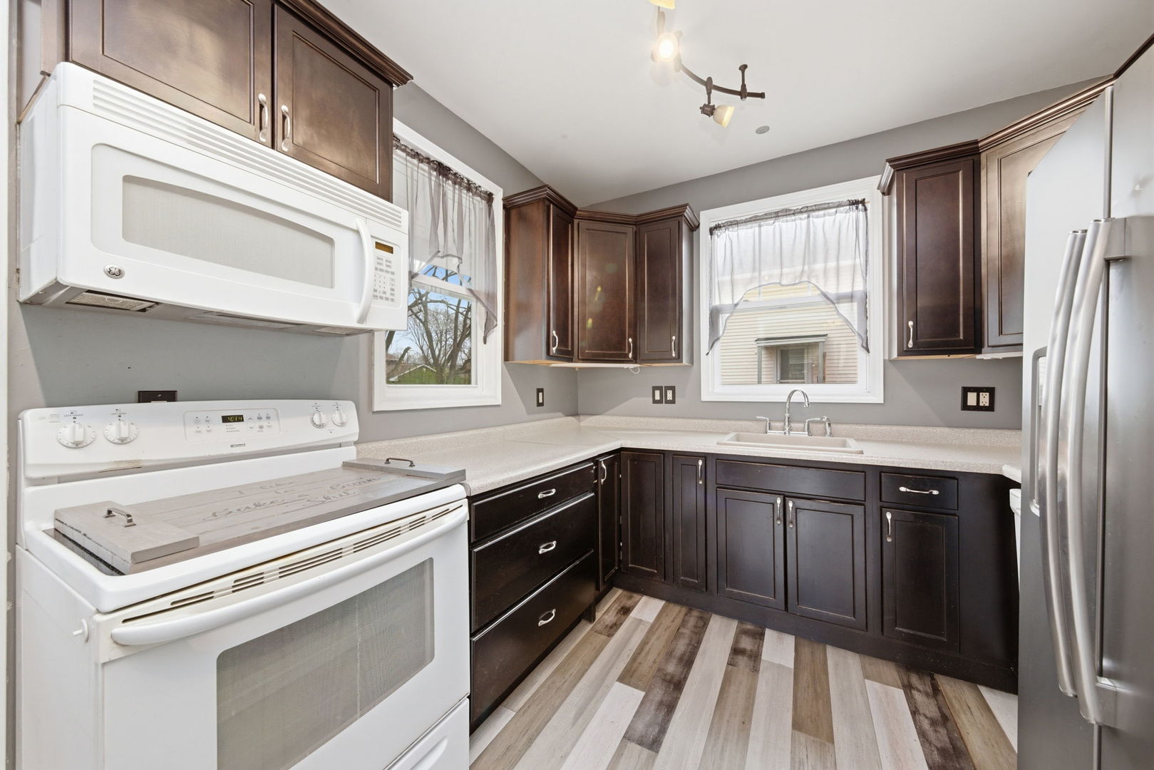 500 Catherine Street Ottawa, IL 61350 - Photo 7 of 23 a kitchen with a stove oven and sink