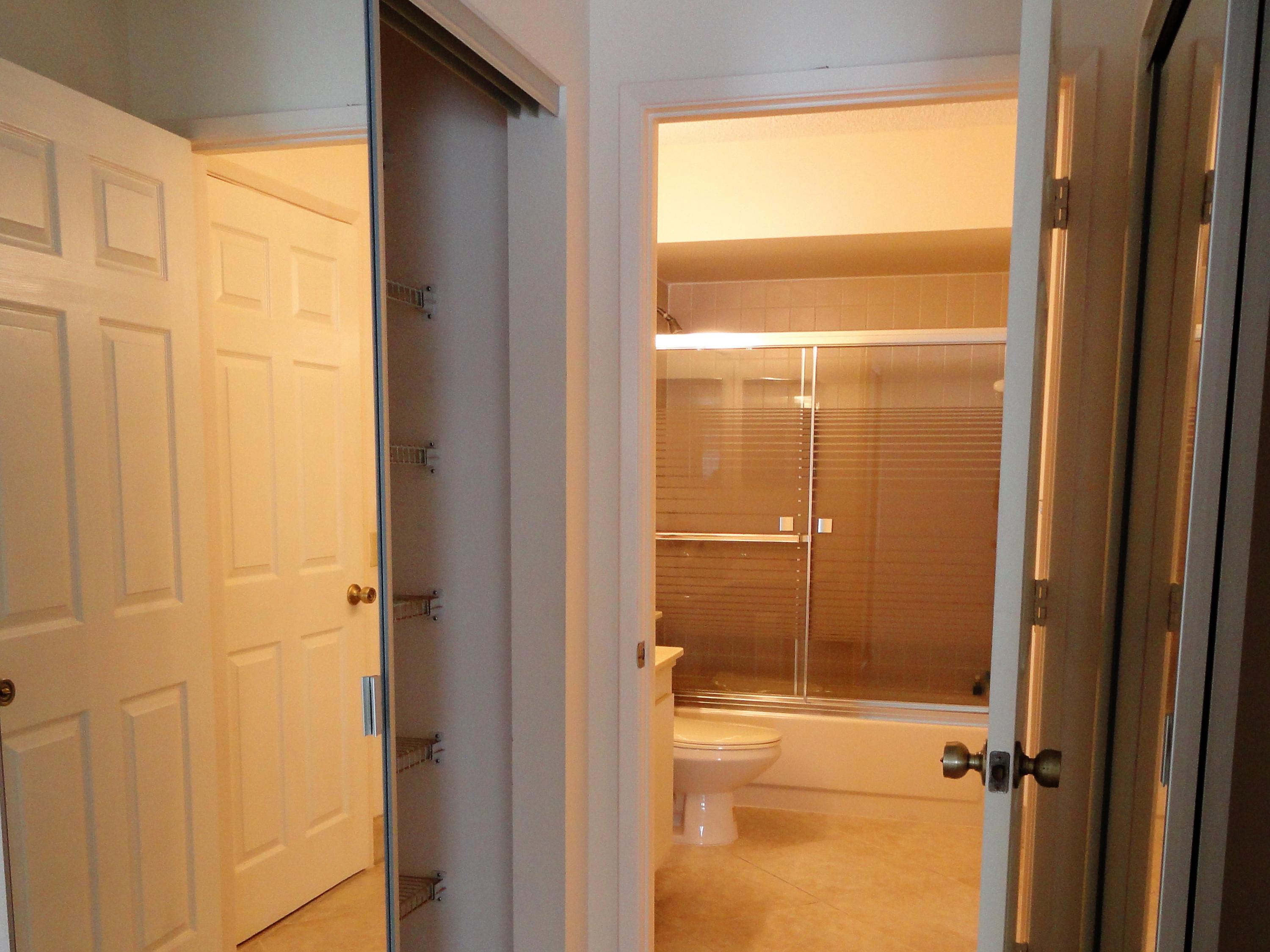9111 Tracy Court, Unit 2 Boca Raton, FL 33496 - Photo 11 of 25 Guest Bathroom adjacent to Guest Bedroom