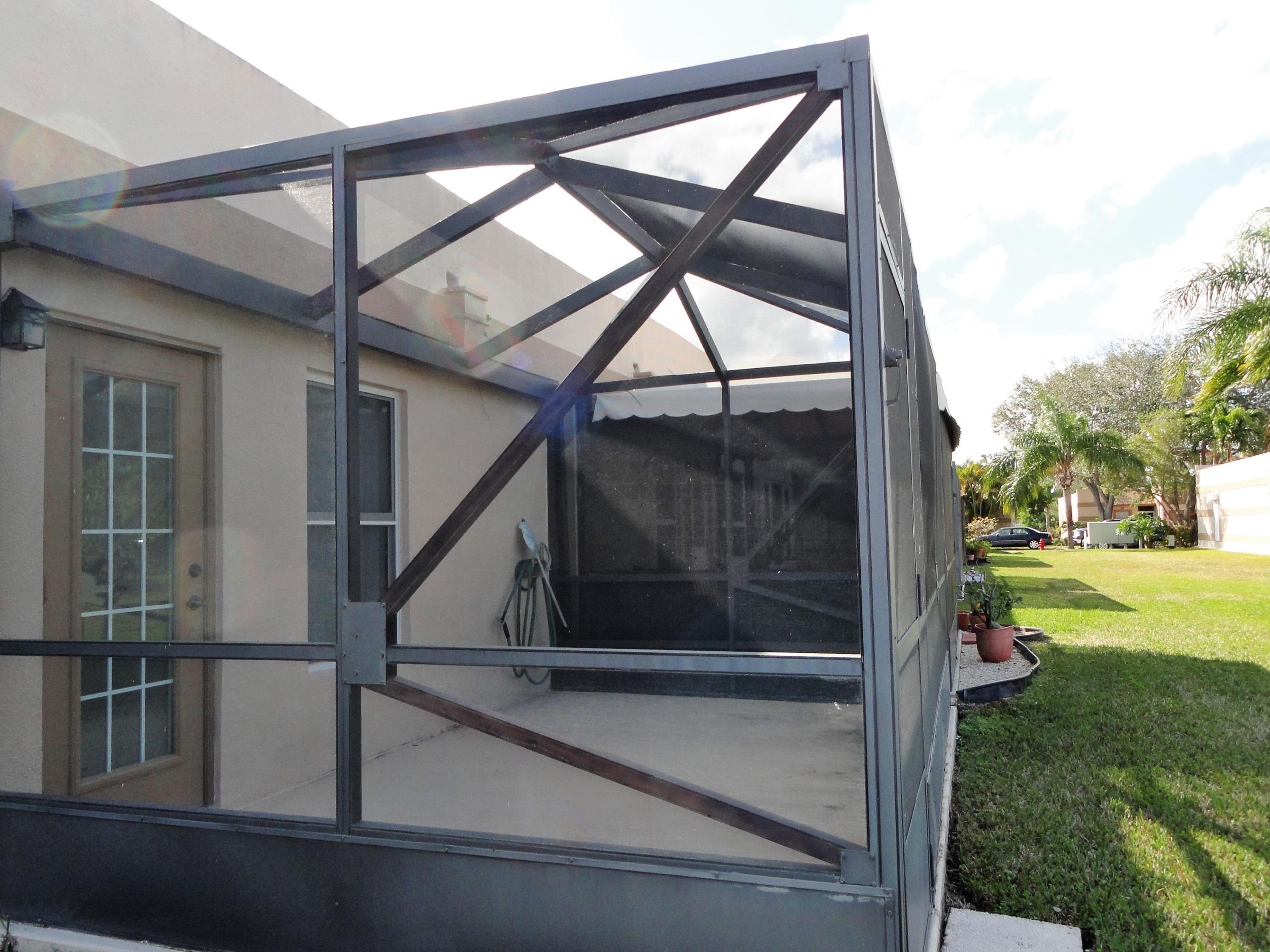 9111 Tracy Court, Unit 2 Boca Raton, FL 33496 - Photo 15 of 25 Screened Patio