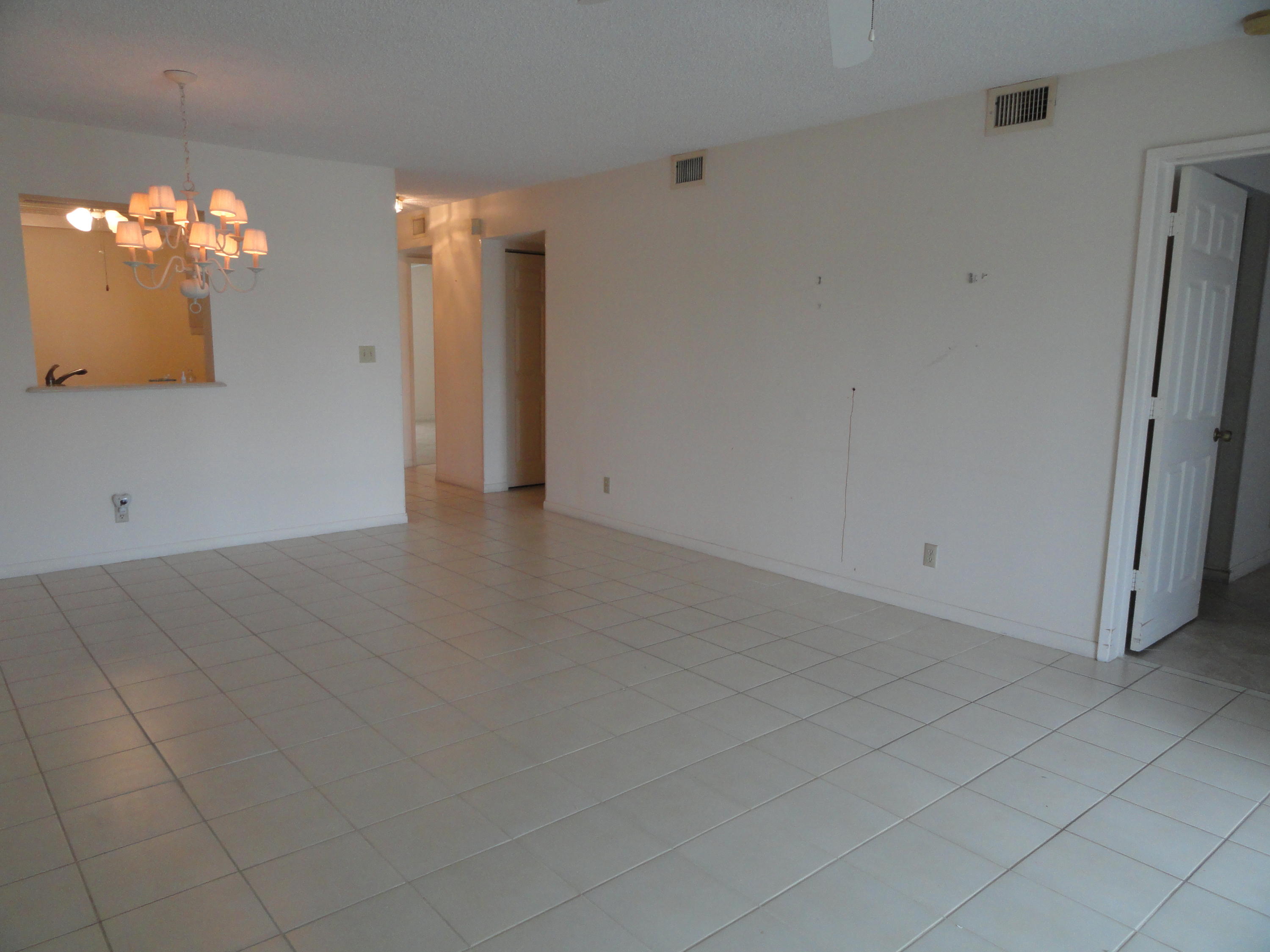 9111 Tracy Court, Unit 2 Boca Raton, FL 33496 - Photo 5 of 25 Dining Room Wall