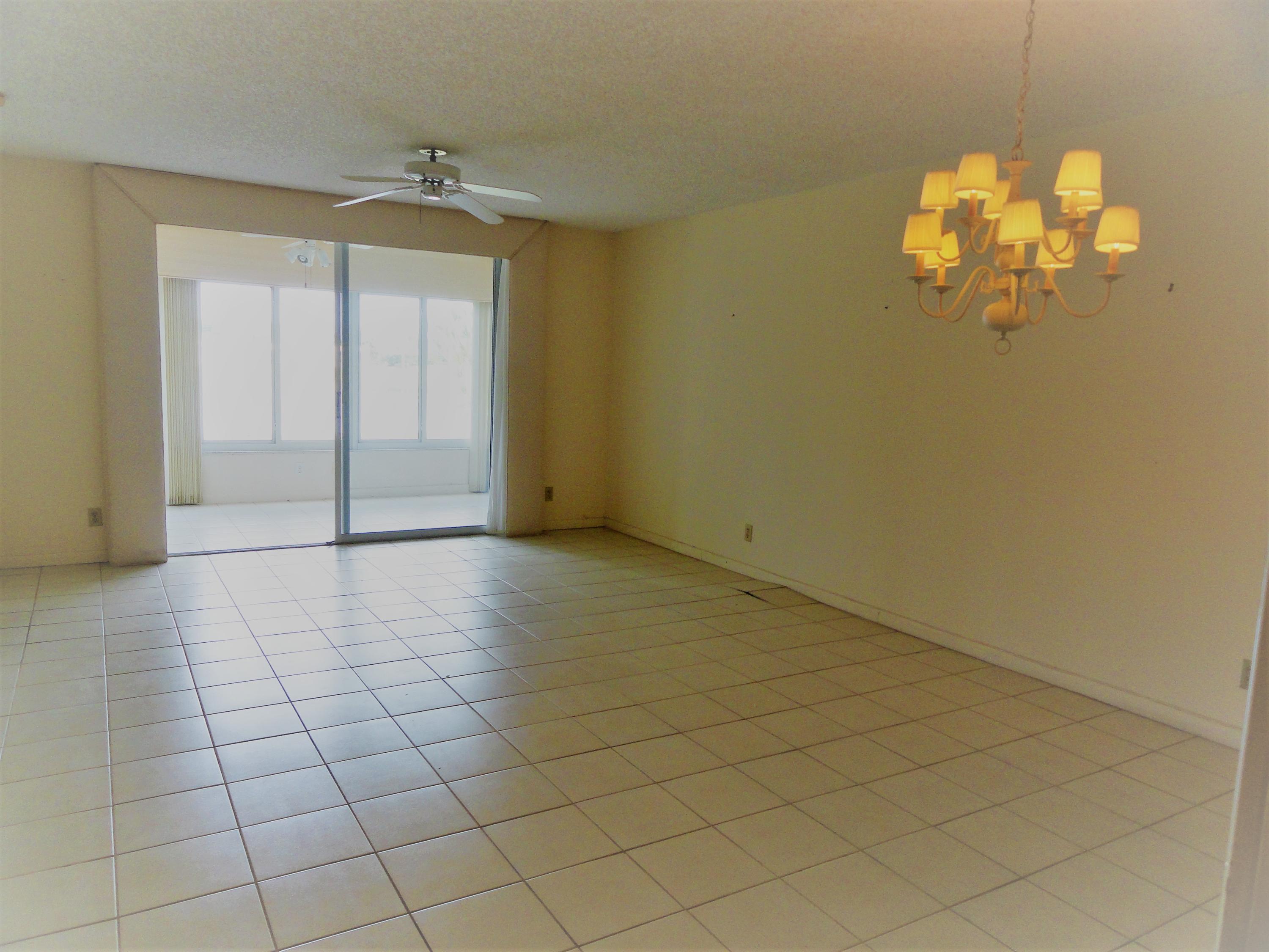 9111 Tracy Court, Unit 2 Boca Raton, FL 33496 - Photo 6 of 25 Spacious Living Room & Dining Room Area