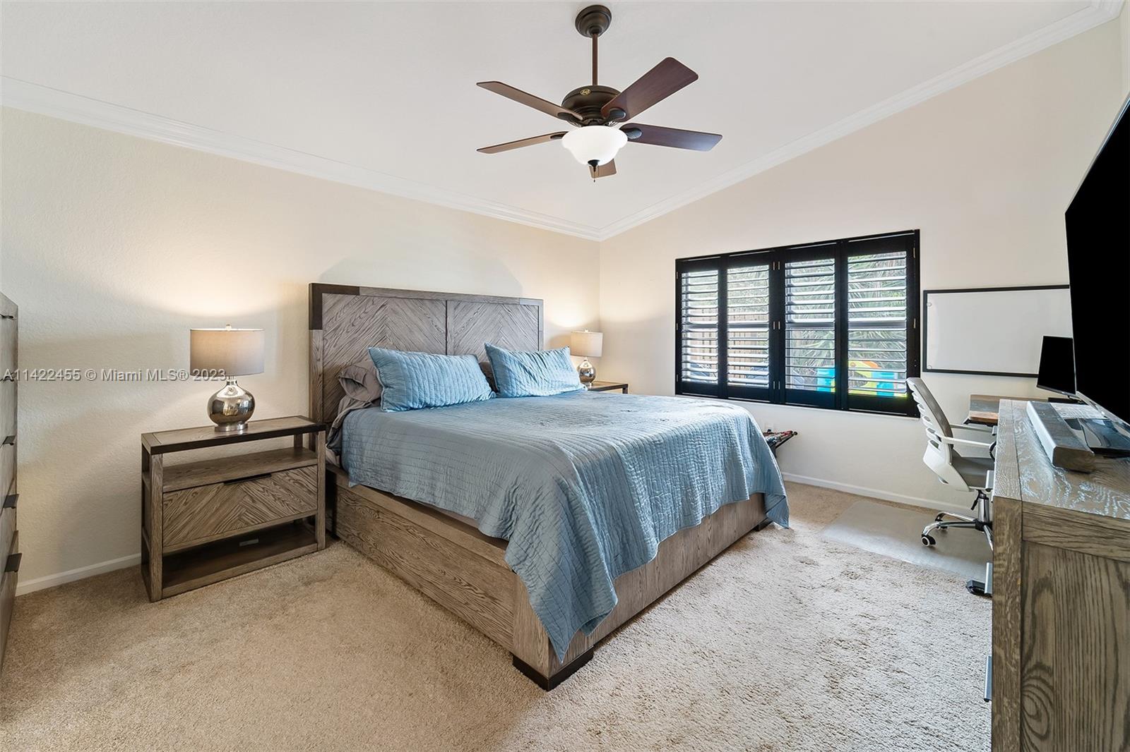 22699 Royal Crown Terrace East Boca Raton, FL 33433 - Photo 14 of 36 a bedroom with bed and window