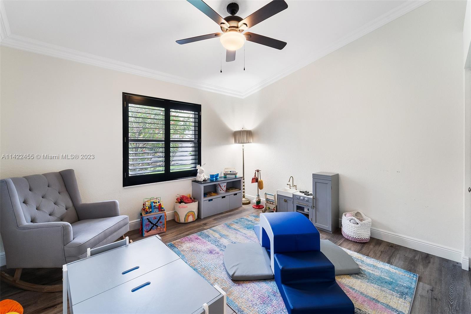 22699 Royal Crown Terrace East Boca Raton, FL 33433 - Photo 15 of 36 a living room with furniture and a window