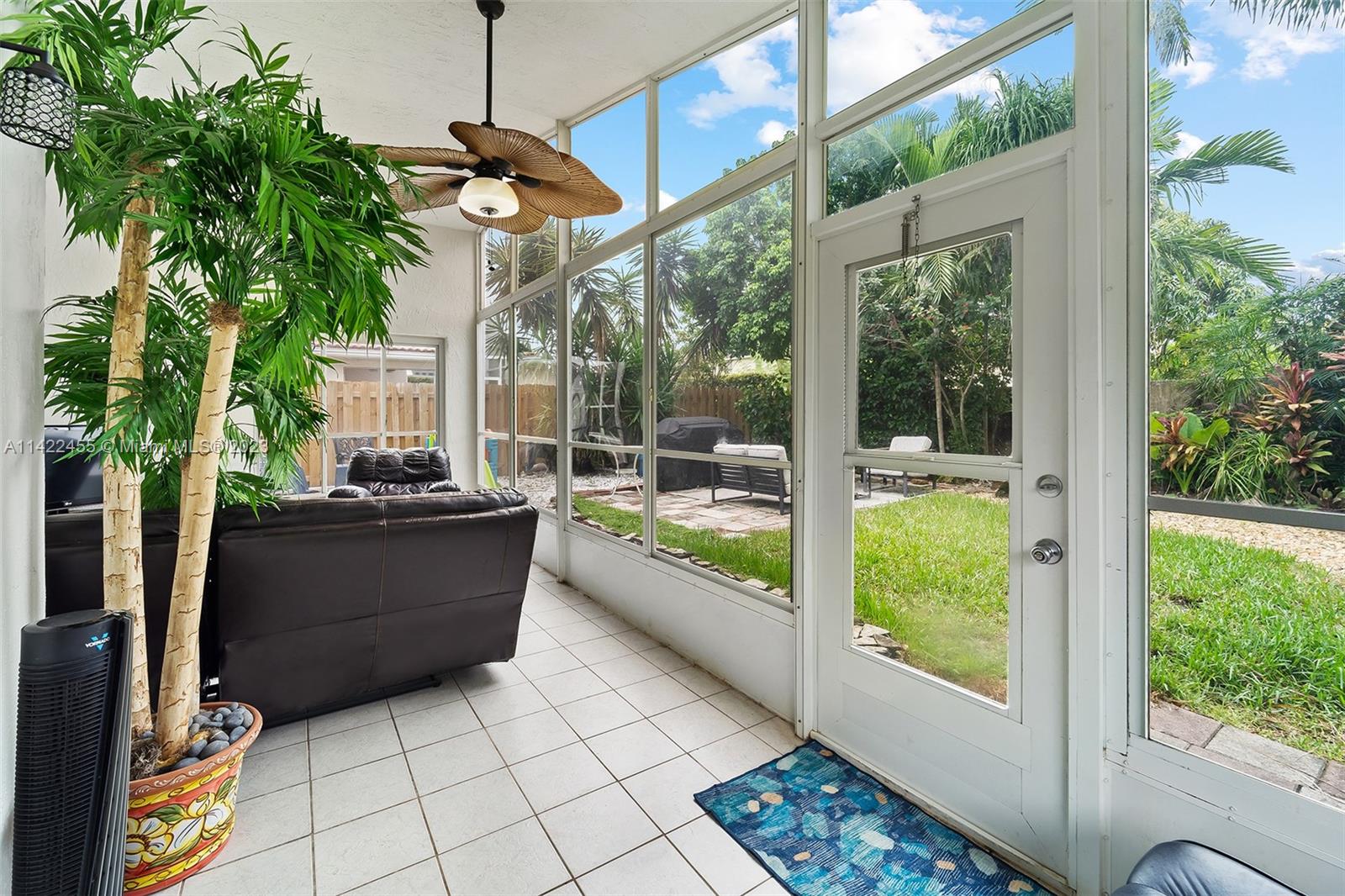 22699 Royal Crown Terrace East Boca Raton, FL 33433 - Photo 21 of 36 a room with furniture and a potted plant