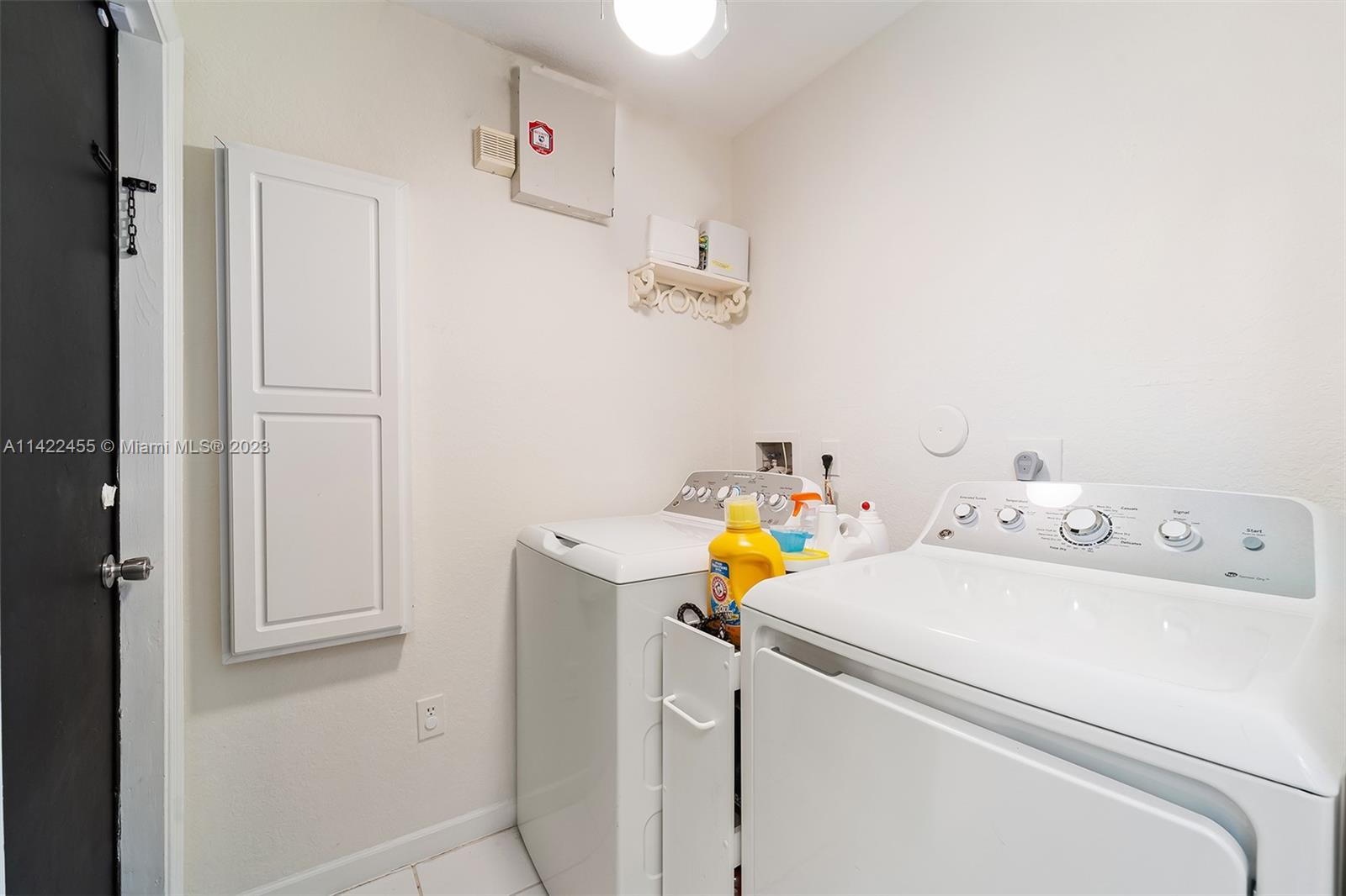 22699 Royal Crown Terrace East Boca Raton, FL 33433 - Photo 35 of 36 a utility room with dryer and washer