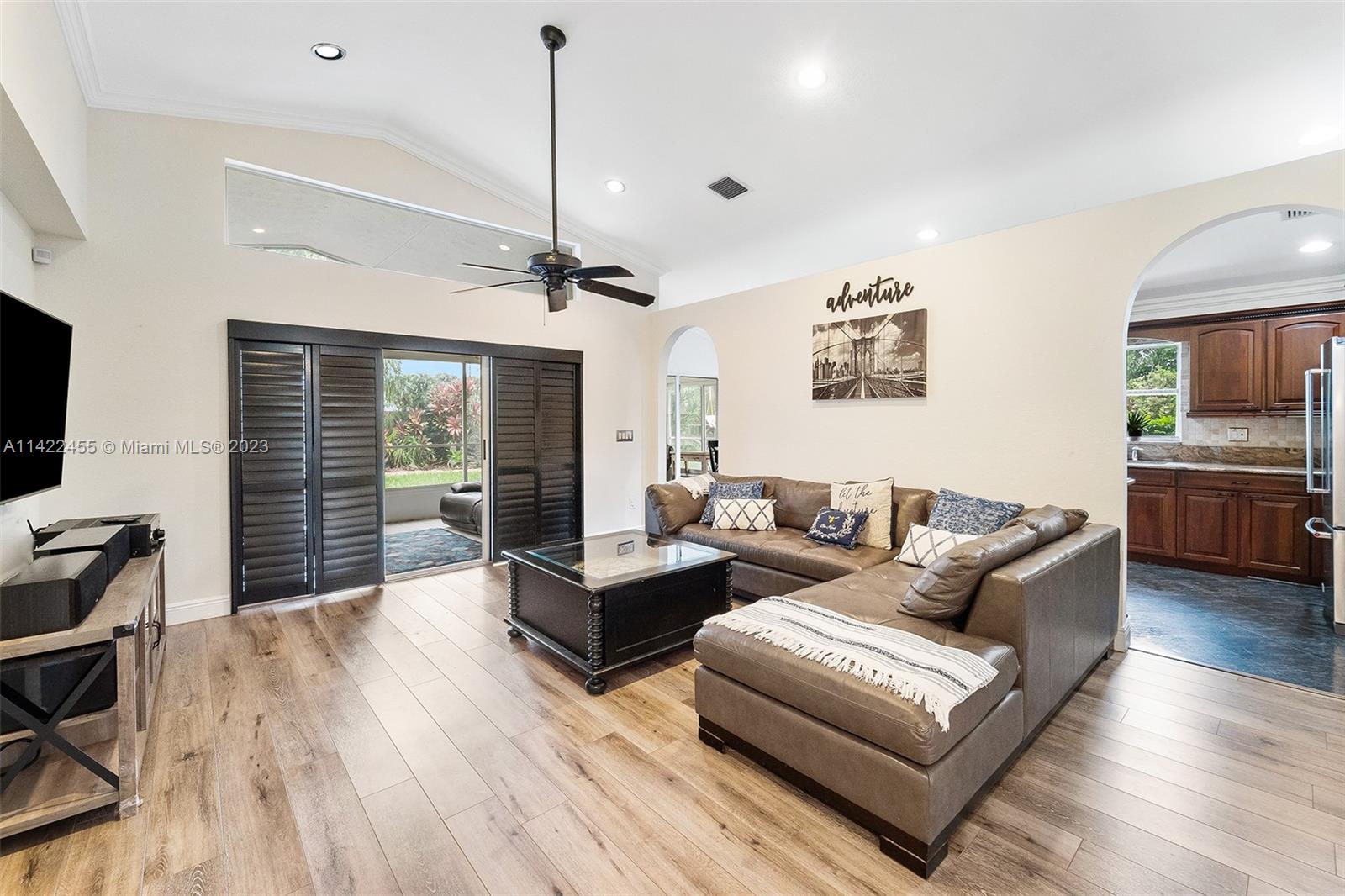 22699 Royal Crown Terrace East Boca Raton, FL 33433 - Photo 7 of 36 a living room with furniture and a flat screen tv