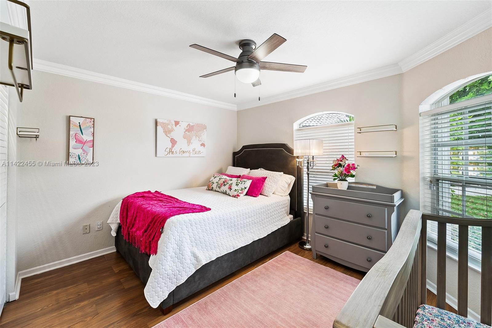 22699 Royal Crown Terrace East Boca Raton, FL 33433 - Photo 8 of 36 a bedroom with a bed and a dresser