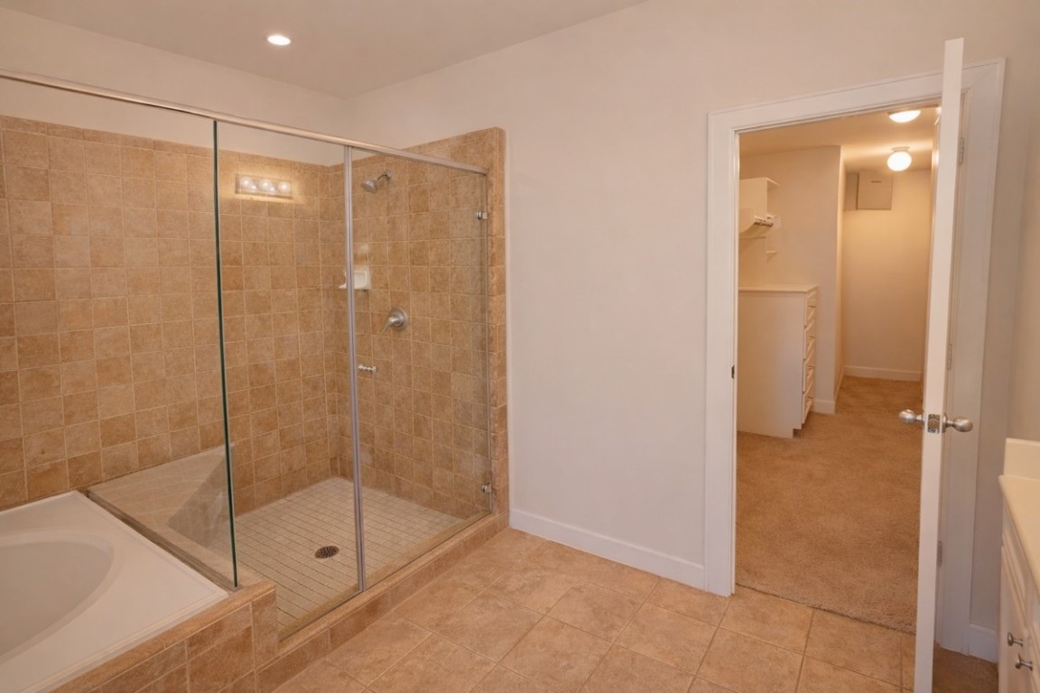2710 Hullsmith Drive, Unit 803 Houston, TX 77063 - Photo 12 of 21 a bathroom with a shower and a sink