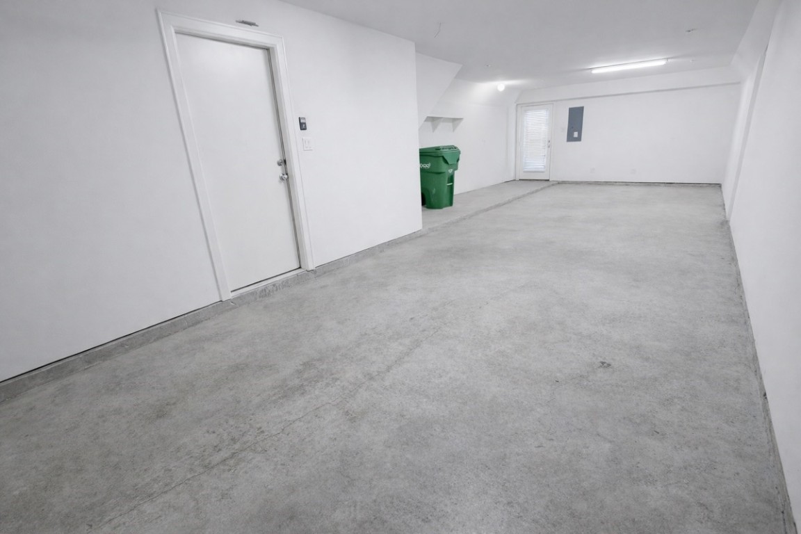 2710 Hullsmith Drive, Unit 803 Houston, TX 77063 - Photo 21 of 21 a view of an empty room with a kitchen