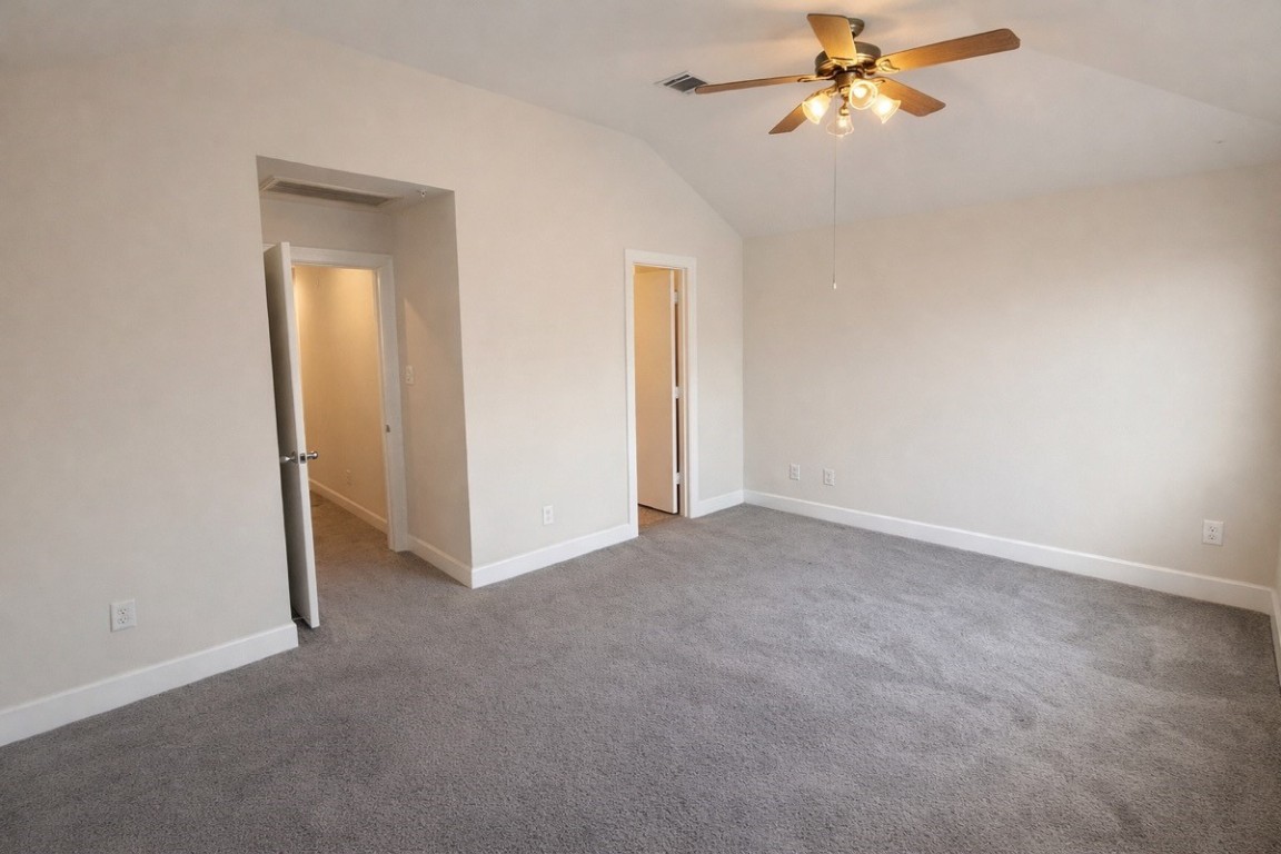 2710 Hullsmith Drive, Unit 803 Houston, TX 77063 - Photo 8 of 21 a view of a room with a ceiling fan and a fan