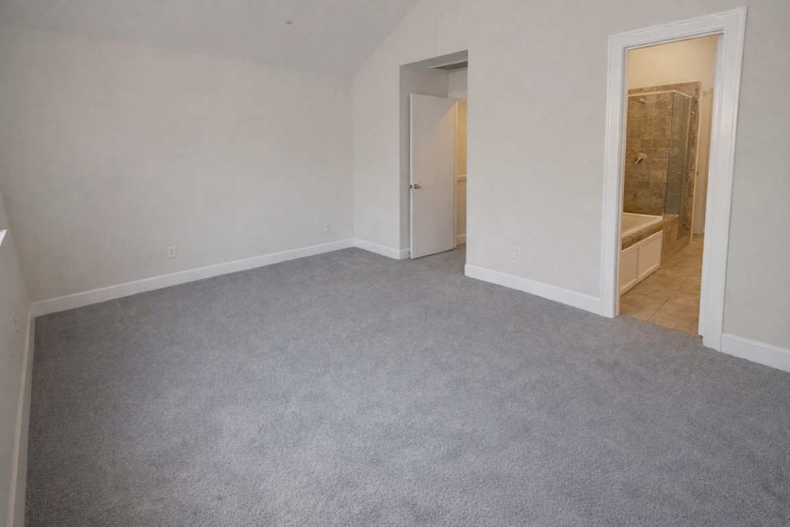 2710 Hullsmith Drive, Unit 803 Houston, TX 77063 - Photo 9 of 21 a view of an empty room and closet area