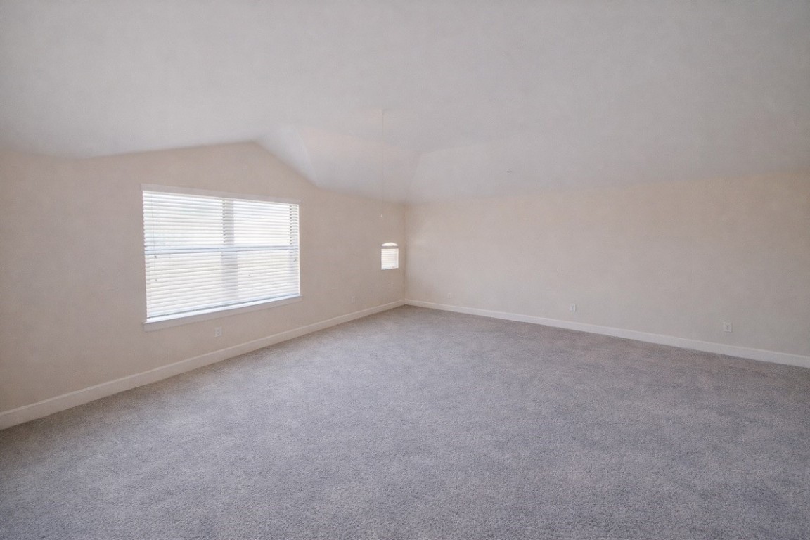 2710 Hullsmith Drive, Unit 803 Houston, TX 77063 - Photo 10 of 21 an empty room with a window