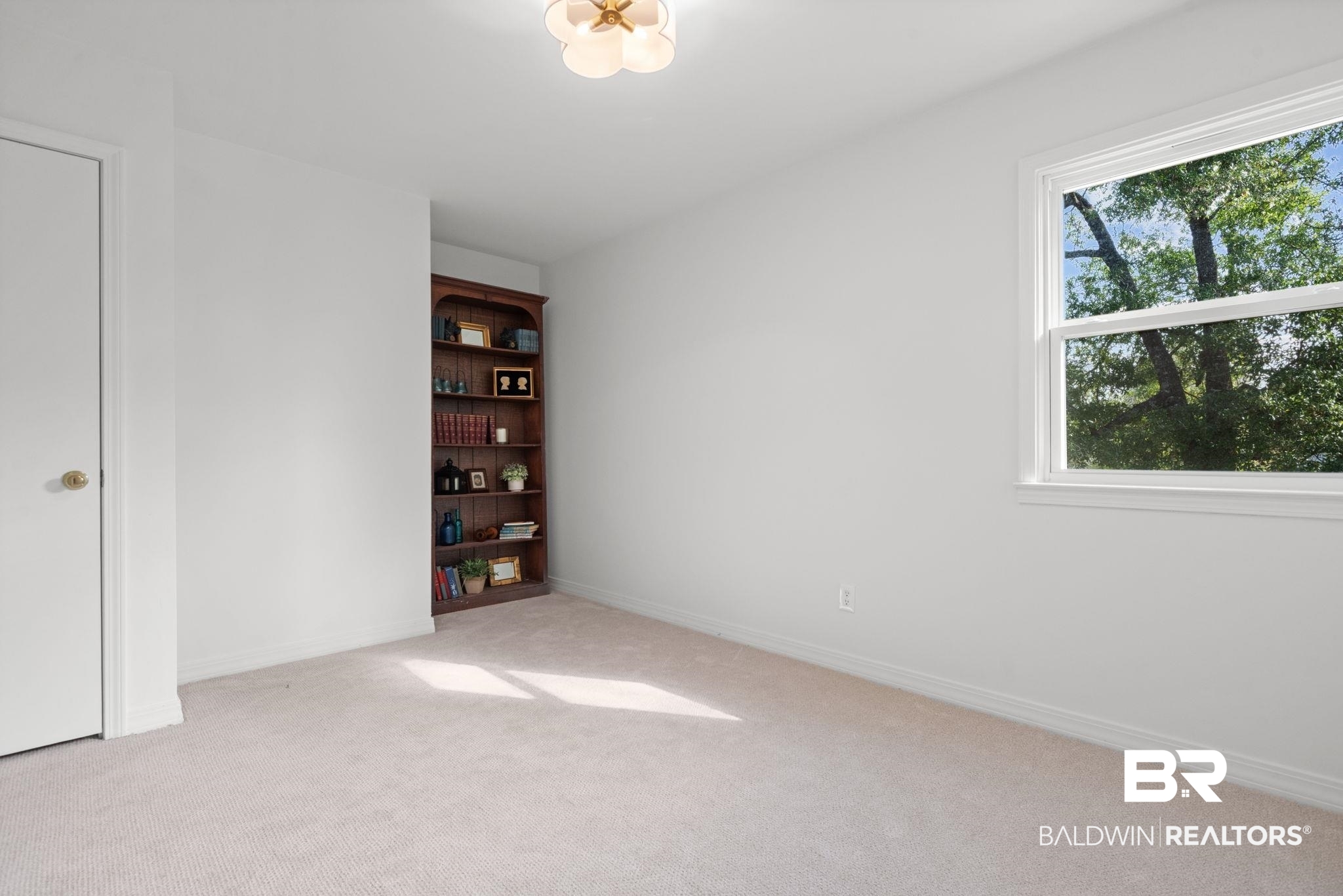 511 Wacker Lane North Mobile, AL 36608 - Photo 26 of 45 Unfurnished bedroom with light colored carpet and baseboards