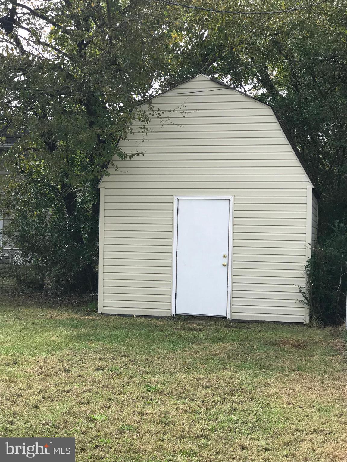 213 Compton Road Waldorf, MD 20602 - Photo 28 of 31 Shed with electric/work bench/loft