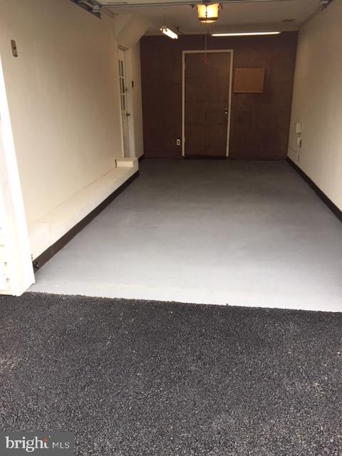 213 Compton Road Waldorf, MD 20602 - Photo 29 of 31 Garage with storage area.