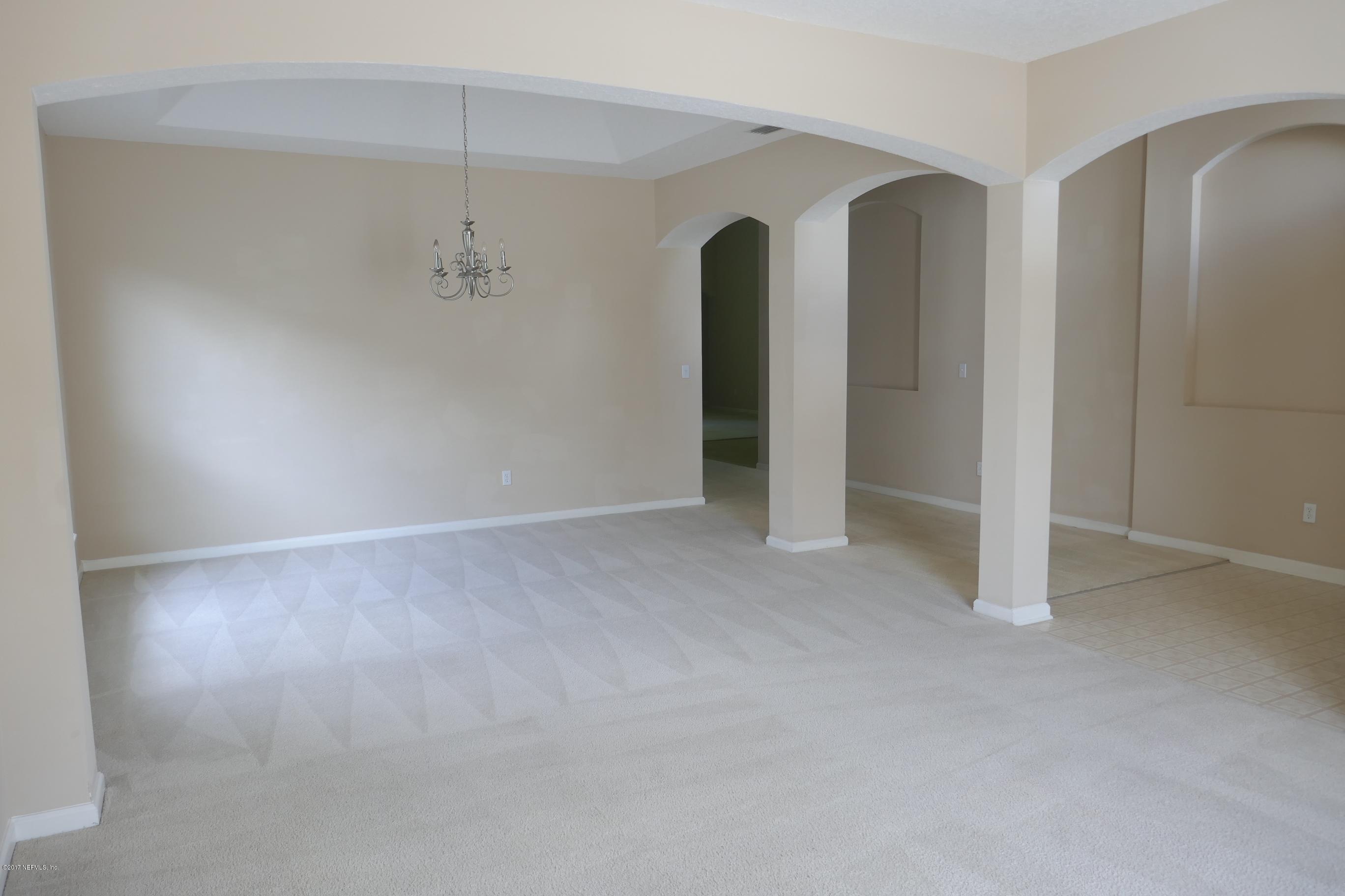 14534 Millhopper Road Jacksonville, FL 32258 - Photo 4 of 23 Living/dining room