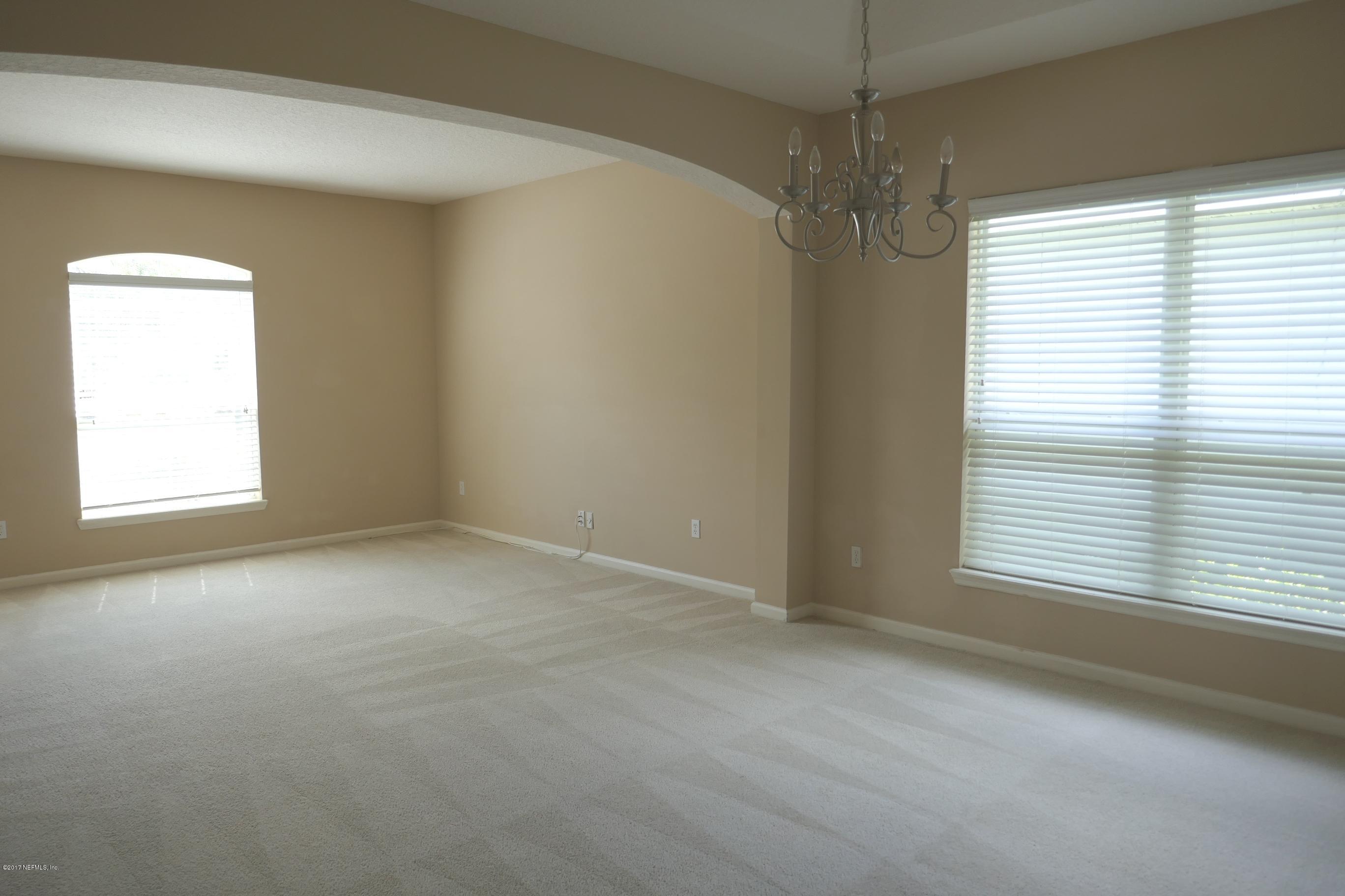 14534 Millhopper Road Jacksonville, FL 32258 - Photo 5 of 23 Living/Dining room
