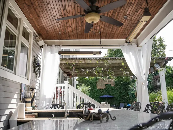 a view of balcony with furniture