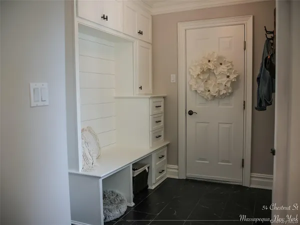 a view of cabinets with entryway