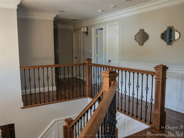 a view of a balcony with furniture