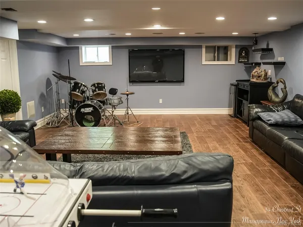 a kitchen with stainless steel appliances kitchen island granite countertop a sink and a stove top oven