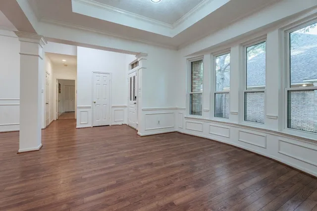 a kitchen with a sink a counter top space cabinets and stainless steel appliances